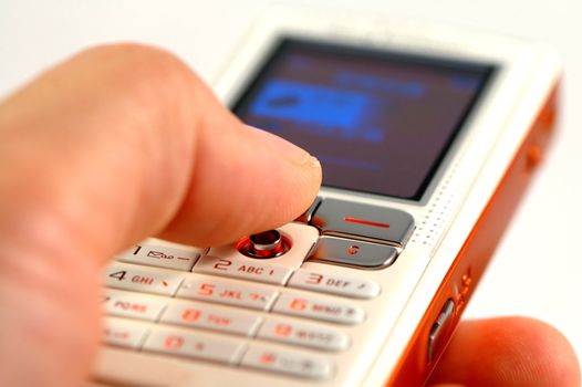 Dialing a modern mobile phone over white