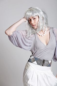 Beautiful woman with silver wig and matching clothing