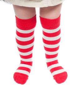 Shot of childrens striped red and white socks