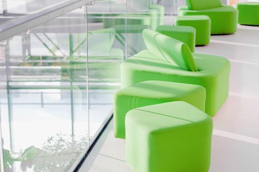 Shot of green armchairs in interior, daylight