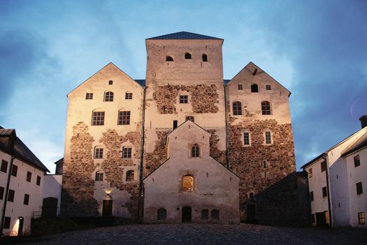 Old castle by night in Turku, Finland. Built in the 13th century.