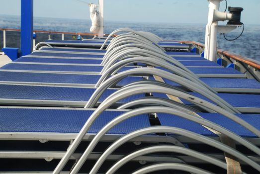 stock pictures of chairs used on the deck of a cruise ship