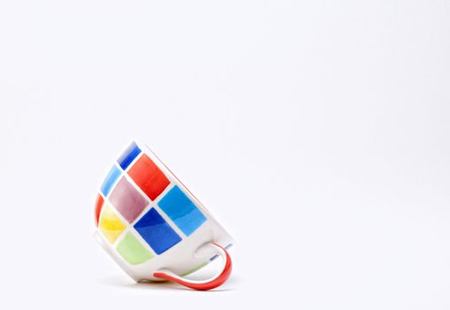 Colourful Checkered Cup on a White Background.