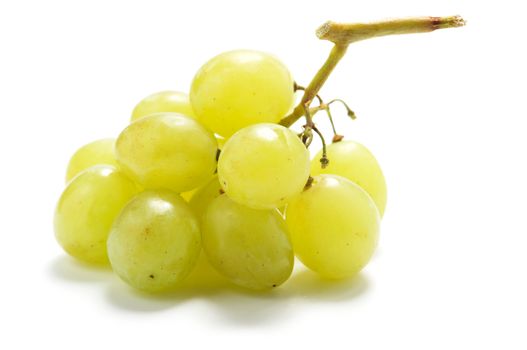 A small cluster of green grapes isolated on a white background.