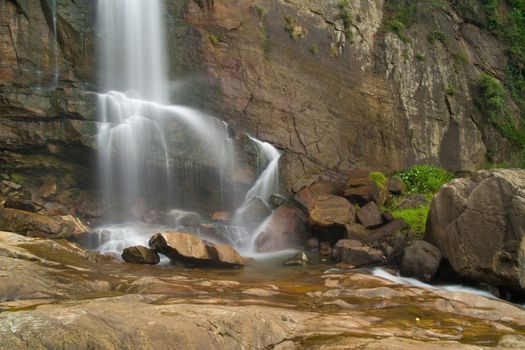 Waterfall in rainforest in Srilanka.
