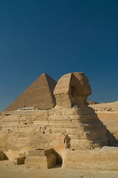 Sphinx and pyramid in Giza Egypt.