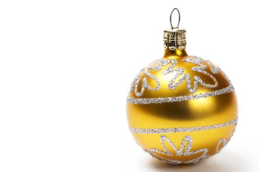 golden christmas ball with glitter stars on white background