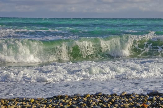 Beautiful sea wave at sunset