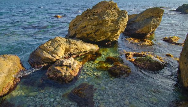 Pure summer sea with stones