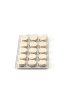 Packing the tablets, insulated on white background