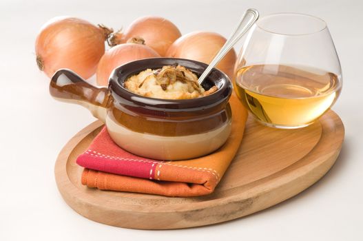 Homemade french onion soup served with white wine.