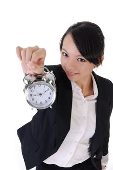 Happy smiling business girl holding alarm clock on white background, closeup portrait.