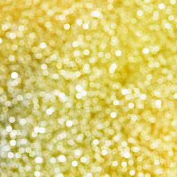 Abstract yellow sparkling bright background - a square