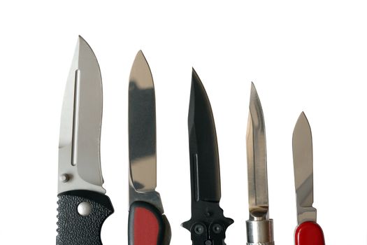 Closeup of few sharp knives isolated on white background with clipping path