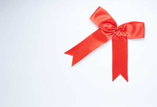 Red Ribbon & Bow isolated on a White Background.