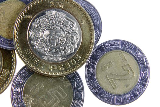 A close-up shot of a bunch of Mexican coins.
