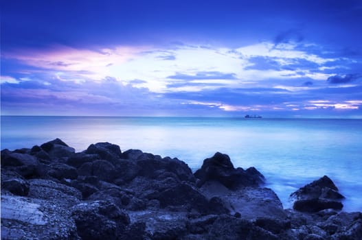 sunset in the sea with blue color