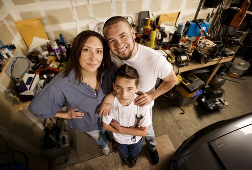 Do-it-yourself family in their garage.