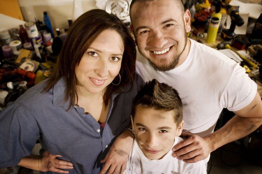 Do-it-yourself family in their garage.