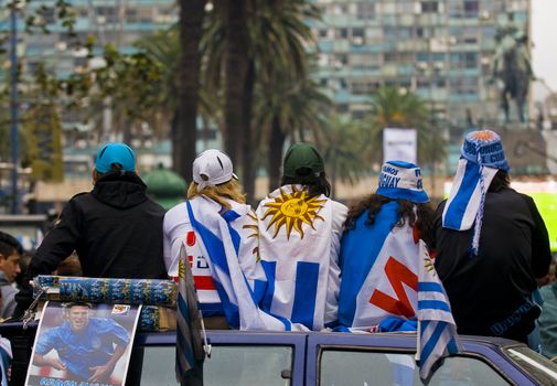 MONTEVIDEO - JULY 06: Uruguayan football funs watching the matcch between Uruguay and Netherlands in the 2010 world cup semifinal  on July 06, 2010 in Montevideo, Uruguay 