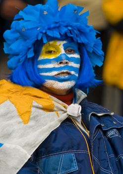 MONTEVIDEO - JULY 06: Uruguayan football fun watching the matcch between Uruguay and Netherlands in the 2010 world cup semifinal  on July 06, 2010 in Montevideo, Uruguay 