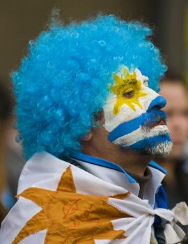 MONTEVIDEO - JULY 06: Uruguayan football fun watching the matcch between Uruguay and Netherlands in the 2010 world cup semifinal  on July 06, 2010 in Montevideo, Uruguay 