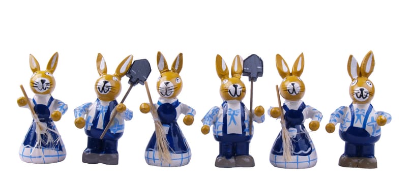 six blue painted wood easter bunnies isolated