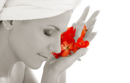 monochrome woman with red flower petals in spa
