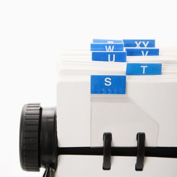 Detail of rolodex with blue tabs.