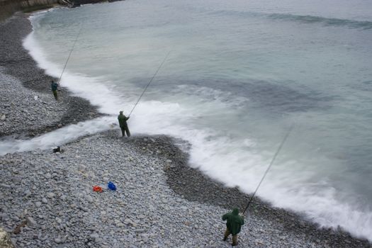 an angler fishing in the sea
