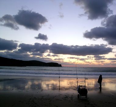 an angler fishing in the sea