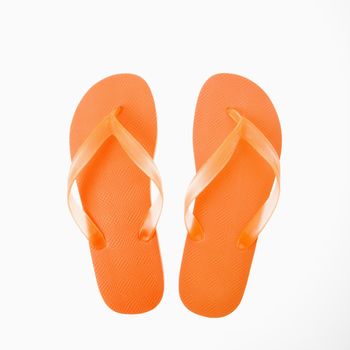 Orang plastic thong flip flops.