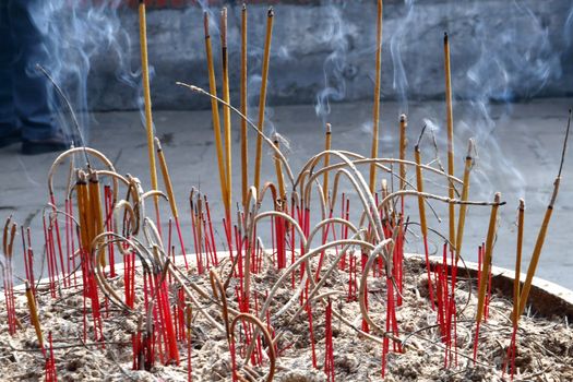 incense burning at a temple during chinese new year celebrations in asia