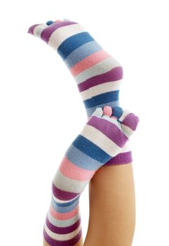 beautiful legs in funny socks over white