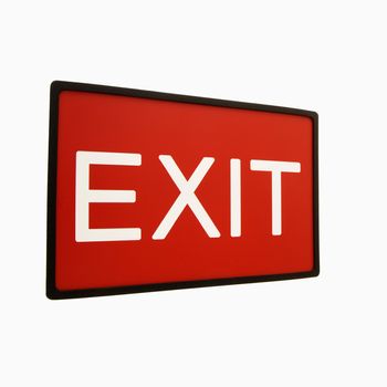 Red exit sign against white background.