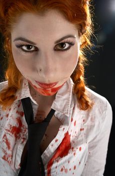 portrait of schoolgirl with blood all over