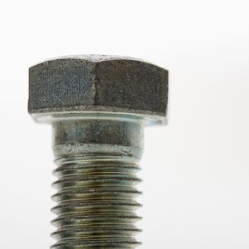 Close up of bolt screw on white background.