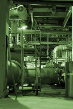 Pipes and tubes and chimney at a power plant