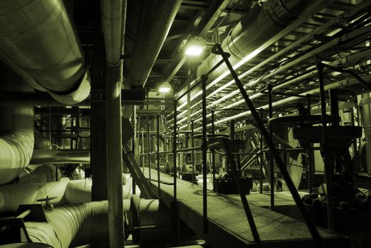 Pipes and tubes and chimney at a power plant