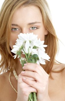 girl with white chrysanthemum flowers