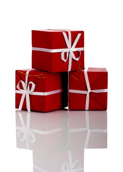 Christmas season! Small gift boxes with reflection