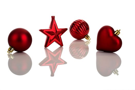 Photo of red Christmas ornaments with reflection