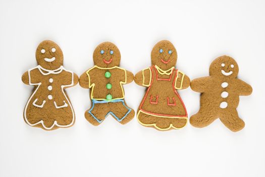 Gingerbread cookies holding hands.