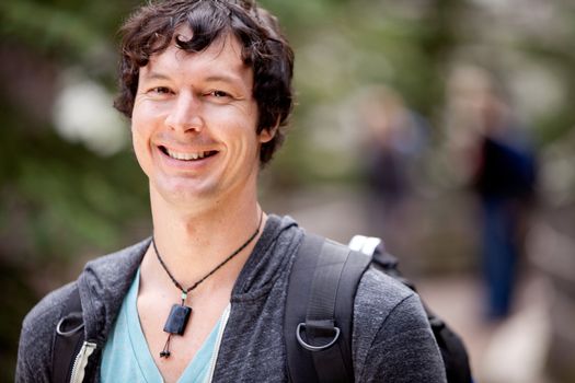 A portrait of a man outdoor on a hike