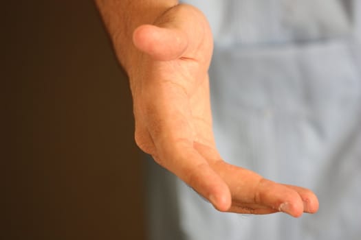 Close up of a mans hand.