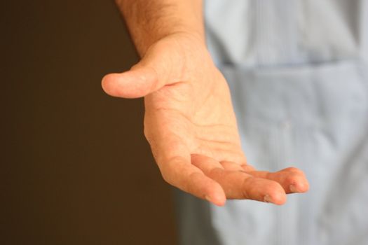Close up of a mans hand.