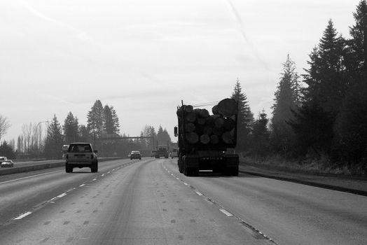 Hauling logs on freeway in Oregon