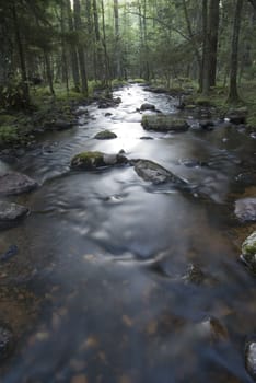 A small river out in the woods, shot with long exposure