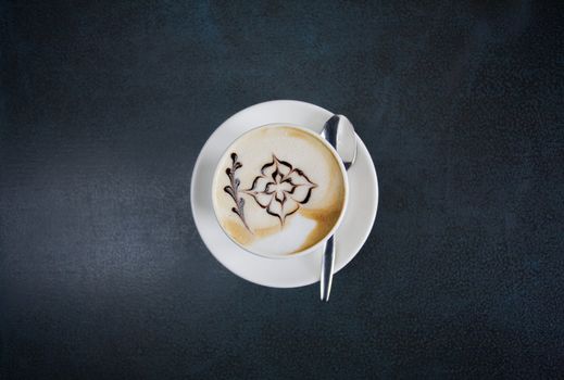 Cappuccino for breakfast at peaceful and nice little coffee bar in old town of Riga, Latvia.