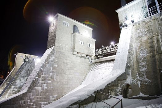 Water dam on a cold winter night.